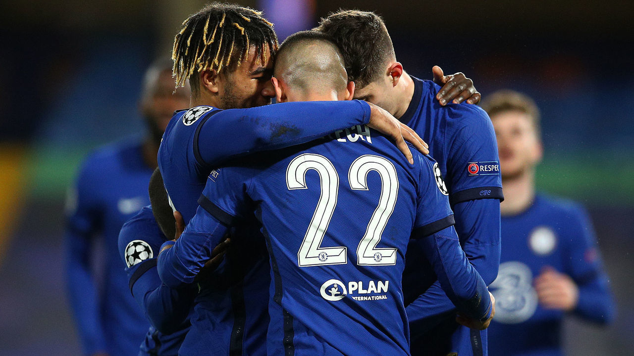 LONDON, ENGLAND - MARCH 17: Hakim Ziyech of Chelsea celebrates with teammates Reece James and Kai Havertz after scoring their team's first goal during the UEFA Champions League Round of 16 match between Chelsea FC and Atletico Madrid at Stamford Bridge on March 17, 2021 in London, England. Sporting stadiums around the UK remain under strict restrictions due to the Coronavirus Pandemic as Government social distancing laws prohibit fans inside venues resulting in games being played behind closed doors.