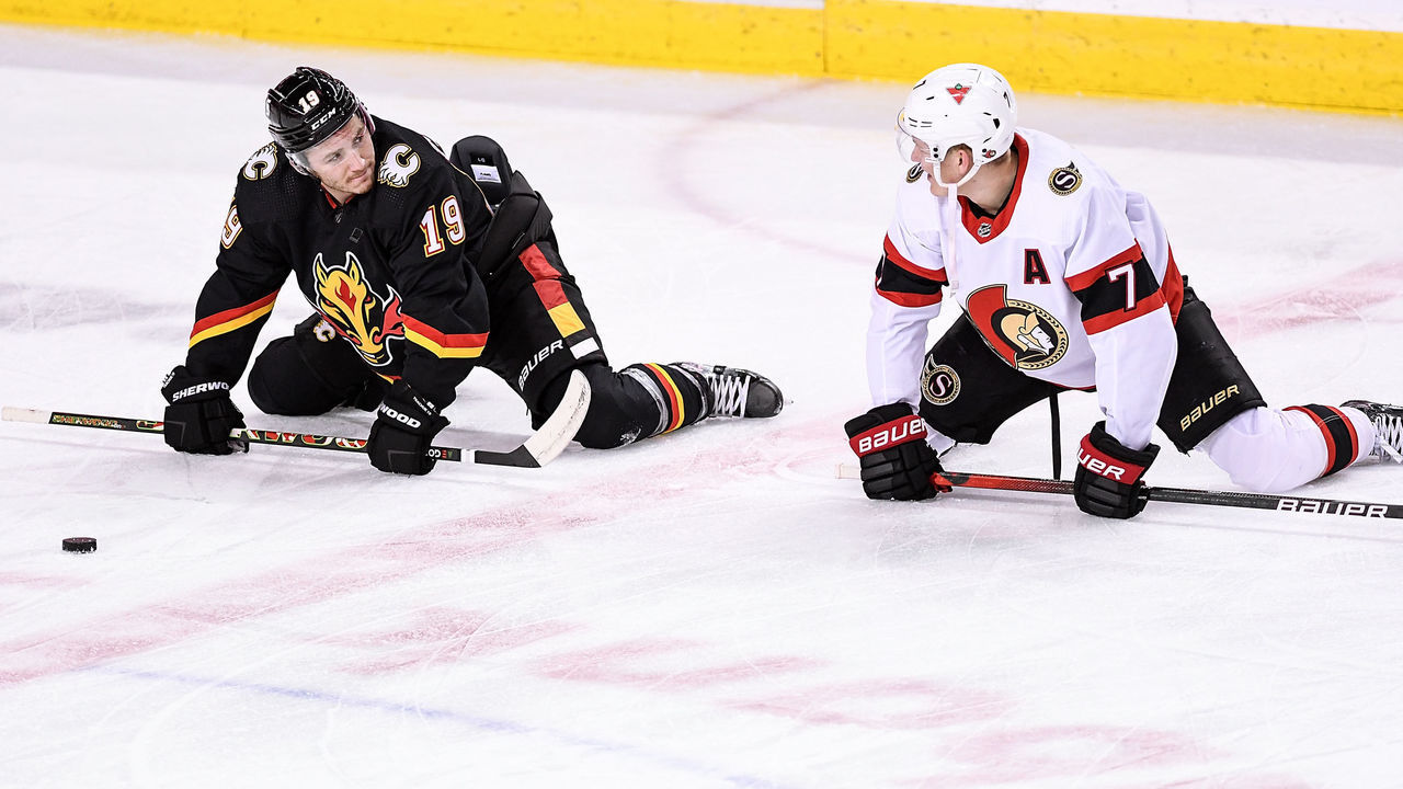 CALGARY, AB - MARCH 04: Calgary Flames Left Wing Matthew Tkachuk (19) and Ottawa Senators Left Wing Brady Tkachuk (7) warm up before an NHL game where the Calgary Flames hosted the Ottawa Senators on March 4, 2021, at the Scotiabank Saddledome in Calgary, AB.