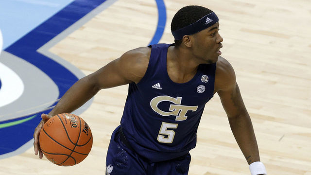 GREENSBORO, NORTH CAROLINA - MARCH 13: Moses Wright #5 of the Georgia Tech Yellow Jackets dribbles during the second half of the ACC Men's Basketball Tournament championship game against the Florida State Seminoles at Greensboro Coliseum on March 13, 2021 in Greensboro, North Carolina.