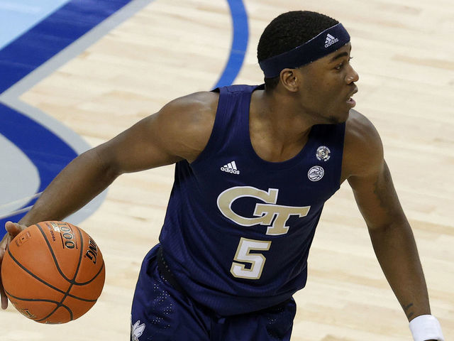 GREENSBORO, NORTH CAROLINA - MARCH 13: Moses Wright #5 of the Georgia Tech Yellow Jackets dribbles during the second half of the ACC Men's Basketball Tournament championship game against the Florida State Seminoles at Greensboro Coliseum on March 13, 2021 in Greensboro, North Carolina.