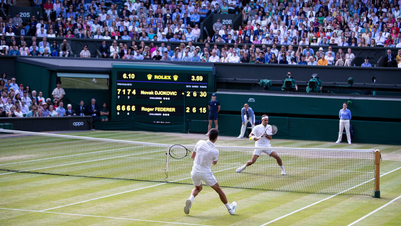 LONDON, ENGLAND - JULY 14: Novak Djokovic of Serbia in action during the Men's Singles Final against Roger Federer of Switzerland at The Wimbledon Lawn Tennis Championship at the All England Lawn and Tennis Club at Wimbledon on July 14, 2019 in London, England.