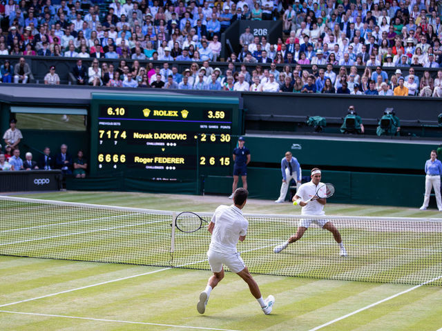 LONDON, ENGLAND - JULY 14: Novak Djokovic of Serbia in action during the Men's Singles Final against Roger Federer of Switzerland at The Wimbledon Lawn Tennis Championship at the All England Lawn and Tennis Club at Wimbledon on July 14, 2019 in London, England.