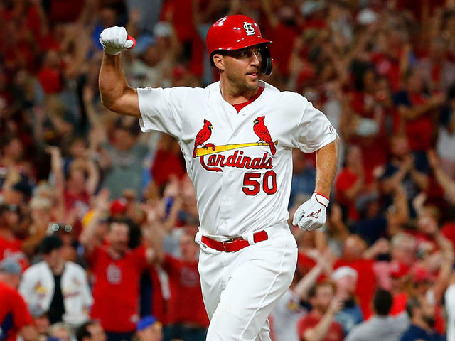 ST LOUIS, MO - SEPTEMBER 13: Adam Wainwright #50 of the St. Louis Cardinals celebrates after Paul Goldschmidt #46 of the St. Louis Cardinals (not pictured) hit a grand slam against the Milwaukee Brewers in the third inning at Busch Stadium on September 13, 2019 in St Louis, Missouri.