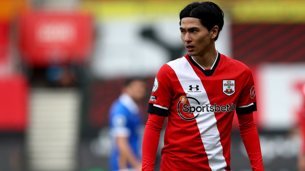 SOUTHAMPTON, ENGLAND - MARCH 14: Takumi Minamino of Southampton during the Premier League match between Southampton and Brighton & Hove Albion at St Mary's Stadium on March 14, 2021 in Southampton, England. Sporting stadiums around the UK remain under strict restrictions due to the Coronavirus Pandemic as Government social distancing laws prohibit fans inside venues resulting in games being played behind closed doors.