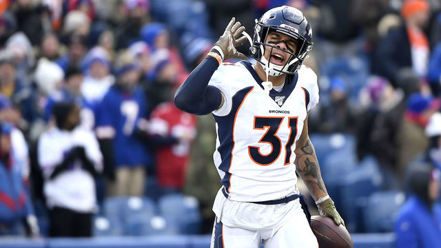 Orchard Park, NY - November 24: Denver Broncos free safety Justin Simmons #31 celebrates after he intercepts the ball in the first half as the Denver Broncos take on the Buffalo Bills at New Era Field in Orchard Park, New York on November 24, 2019.