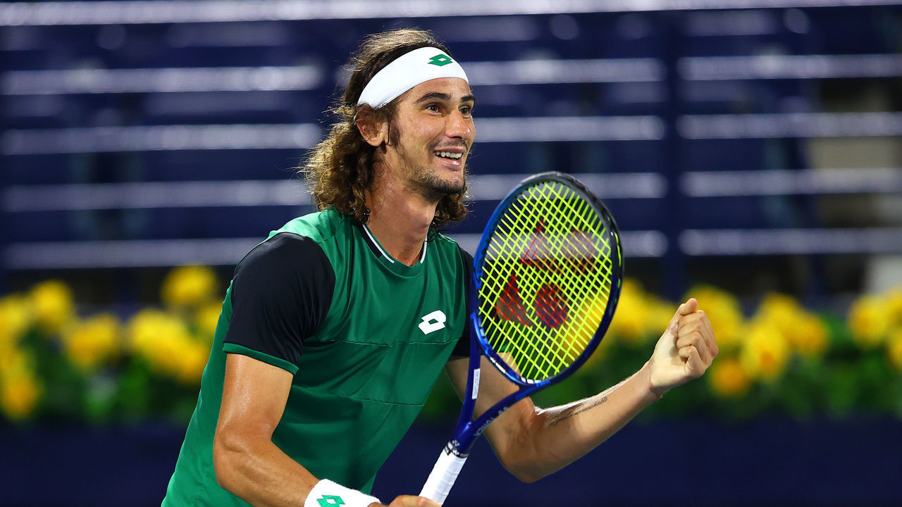 DUBAI, UNITED ARAB EMIRATES - MARCH 19: Lloyd Harris of South Africa celebrates victory after the Men's Single's Semi-Final match between Denis Shapovalov and Lloyd Harris on Day Thirteen of the Dubai Duty Free Tennis at Dubai Duty Free Tennis Stadium on March 19, 2021 in Dubai, United Arab Emirates.