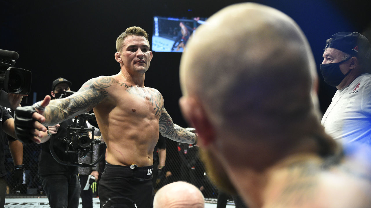 ABU DHABI, UNITED ARAB EMIRATES - JANUARY 23: (L-R) Dustin Poirier greets Conor McGregor of Ireland after his victory in their lightweight fight during the UFC 257 event inside Etihad Arena on UFC Fight Island on January 23, 2021 in Abu Dhabi, United Arab Emirates.