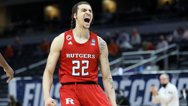 INDIANAPOLIS, INDIANA - MARCH 19: Caleb McConnell #22 of the Rutgers Scarlet Knights reacts in the second half against the Clemson Tigers in the first round game of the 2021 NCAA Men's Basketball Tournament at Bankers Life Fieldhouse on March 19, 2021 in Indianapolis, Indiana.