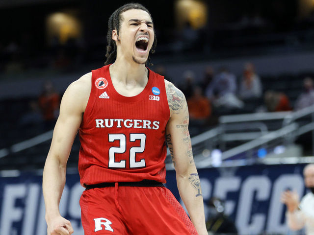 INDIANAPOLIS, INDIANA - MARCH 19: Caleb McConnell #22 of the Rutgers Scarlet Knights reacts in the second half against the Clemson Tigers in the first round game of the 2021 NCAA Men's Basketball Tournament at Bankers Life Fieldhouse on March 19, 2021 in Indianapolis, Indiana.