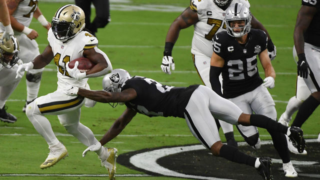 LAS VEGAS, NEVADA - SEPTEMBER 21: Running back Alvin Kamara #41 of the New Orleans Saints is tackled by cornerback Trayvon Mullen #27 of the Las Vegas Raiders during the first half of the NFL game at Allegiant Stadium on September 21, 2020 in Las Vegas, Nevada. The Raiders defeated the Saints 34-24.