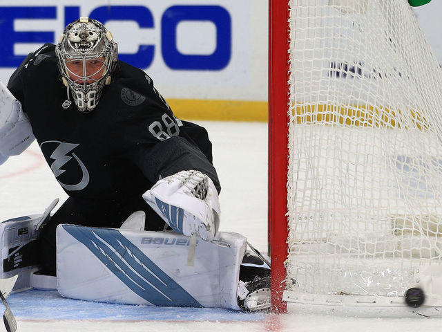 TAMPA, FLORIDA - MARCH 20: Andrei Vasilevskiy #88 of the Tampa Bay Lightning makes a save during a game against the Chicago Blackhawks at Amalie Arena on March 20, 2021 in Tampa, Florida.