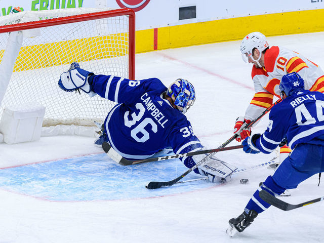 TORONTO, ON - MARCH 20: Toronto Maple Leafs Goalie Jack Campbell (36) makes a save on Calgary Flames Center Derek Ryan (10) during the NHL regular season game between the Calgary Flames and the Toronto Maple Leafs on March 20, 2021, at Scotiabank Arena in Toronto, ON, Canada.