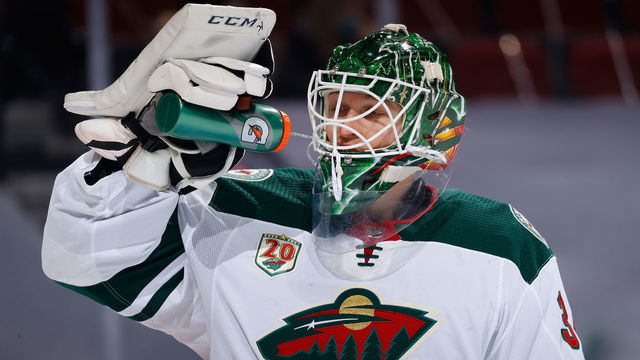 GLENDALE, ARIZONA - MARCH 05: Goaltender Kaapo Kahkonen #34 of the Minnesota Wild drinks from a gatorade bottle during the NHL game against the Arizona Coyotes at Gila River Arena on March 05, 2021 in Glendale, Arizona. The Wild defeated the Coyotes 5-1.