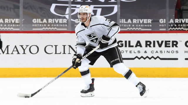 GLENDALE, ARIZONA - FEBRUARY 18: Matt Roy #3 of the Los Angeles Kings skates with the puck against the Arizona Coyotes at Gila River Arena on February 18, 2021 in Glendale, Arizona.