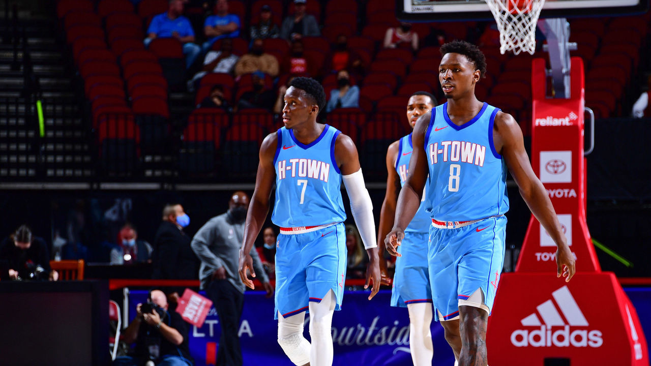 HOUSTON, TX - MARCH 21: Victor Oladipo #7 of the Houston Rockets and Jae'Sean Tate #8 of the Houston Rockets walk on during the game against the Oklahoma City Thunder on March 21, 2021 at the Toyota Center in Houston, Texas. Mandatory Copyright Notice: Copyright 2021 NBAE