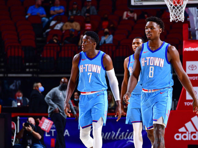 HOUSTON, TX - MARCH 21: Victor Oladipo #7 of the Houston Rockets and Jae'Sean Tate #8 of the Houston Rockets walk on during the game against the Oklahoma City Thunder on March 21, 2021 at the Toyota Center in Houston, Texas. Mandatory Copyright Notice: Copyright 2021 NBAE