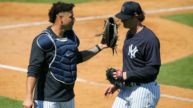 TAMPA, FL - FEBRUARY 25: Catcher Gary Sanchez (24) of the Yankees congratulates pitcher Gerrit Cole (45) during the New York Yankees spring training work out on February 25, 2021, at Steinbrenner Field in Tampa, FL.