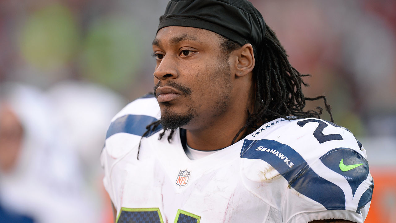SAN FRANCISCO, CA - DECEMBER 08: Marshawn Lynch #24 of the Seattle Seahawks looks on from the sideline during the fourth quarter against the San Francisco 49ers at Candlestick Park on December 8, 2013 in San Francisco, California.