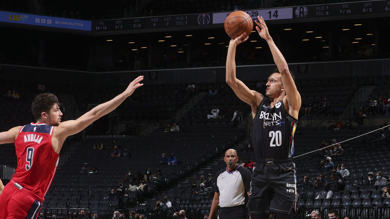 BROOKLYN, NY - MARCH 21: Landry Shamet #20 of the Brooklyn Nets shoots the ball during the game against the Washington Wizards on March 21, 2021 at Barclays Center in Brooklyn, New York. Mandatory Copyright Notice: Copyright 2021 NBAE
