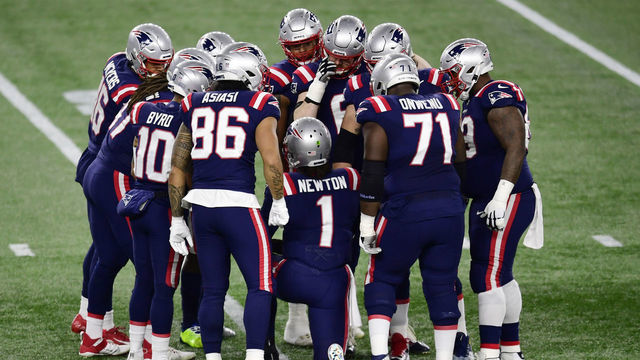 FOXBOROUGH, MASSACHUSETTS - DECEMBER 28: The New England Patriots huddle during the first half against the Buffalo Bills at Gillette Stadium on December 28, 2020 in Foxborough, Massachusetts.