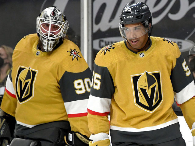 LAS VEGAS, NEVADA - MARCH 22: Keegan Kolesar #55 of the Vegas Golden Knights smiles after being congratulated by teammate Robin Lehner #90 after Kolesar scored his first NHL goal in the third period of a game against the St. Louis Blues at T-Mobile Arena on March 22, 2021 in Las Vegas, Nevada. The Golden Knights defeated the Blues 5-1.