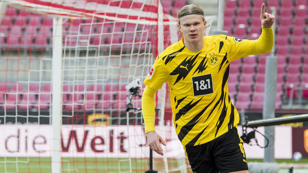 COLOGNE, GERMANY - MARCH 20: Erling Haaland of Borussia Dortmund celebrates scoring his goal to the 0:1 during the Bundesliga match between 1. FC Koeln and Borussia Dortmund at the RheinEnergieStadion on March 20, 2021 in Cologne, Germany.