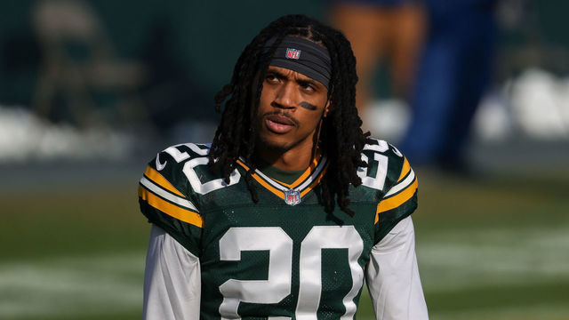 GREEN BAY, WISCONSIN - JANUARY 24: Kevin King #20 of the Green Bay Packers walks across the field before the NFC Championship game against the Tampa Bay Buccaneers at Lambeau Field on January 24, 2021 in Green Bay, Wisconsin.