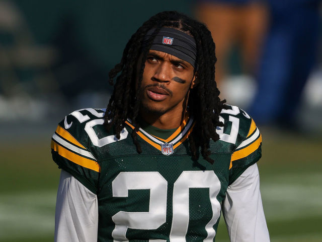 GREEN BAY, WISCONSIN - JANUARY 24: Kevin King #20 of the Green Bay Packers walks across the field before the NFC Championship game against the Tampa Bay Buccaneers at Lambeau Field on January 24, 2021 in Green Bay, Wisconsin.