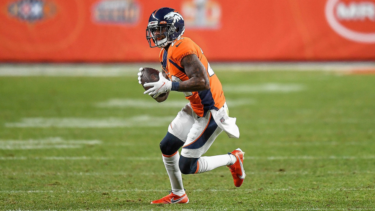 DENVER, CO - JANUARY 03: Denver Broncos strong safety Kareem Jackson (22) returns a fourth quarter interception during a game between the Denver Broncos and the Las Vegas Raiders at Empower Field at Mile High on January 3, 2021 in Denver, Colorado.