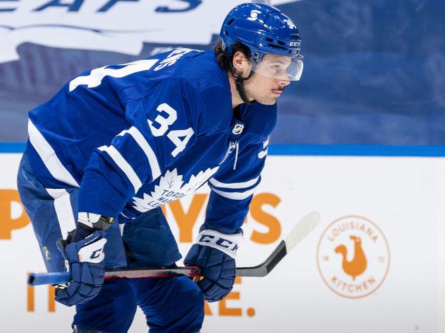 TORONTO, ON - MARCH 20: Auston Matthews #34 of the Toronto Maple Leafs gets ready for a face-off against the Calgary Flames during the first period at the Scotiabank Arena on March 20, 2021 in Toronto, Ontario, Canada.