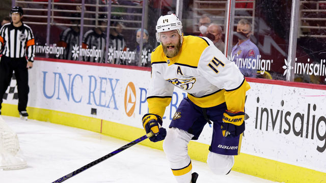 RALEIGH, NC - MARCH 9: Mattias Ekholm #14 of the Nashville Predators skates for position on the ice during an NHL game against the Carolina Hurricanes on March 9, 2021 at PNC Arena in Raleigh, North Carolina.