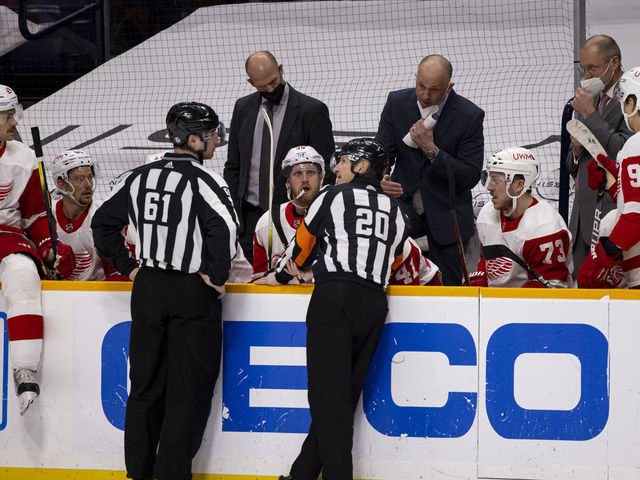 NASHVILLE, TN - MARCH 23: Head coach Jeff Blashill of the Detroit Red Wings challenges a goal by the Nashville Predators during the second period at Bridgestone Arena on March 23, 2021 in Nashville, Tennessee.