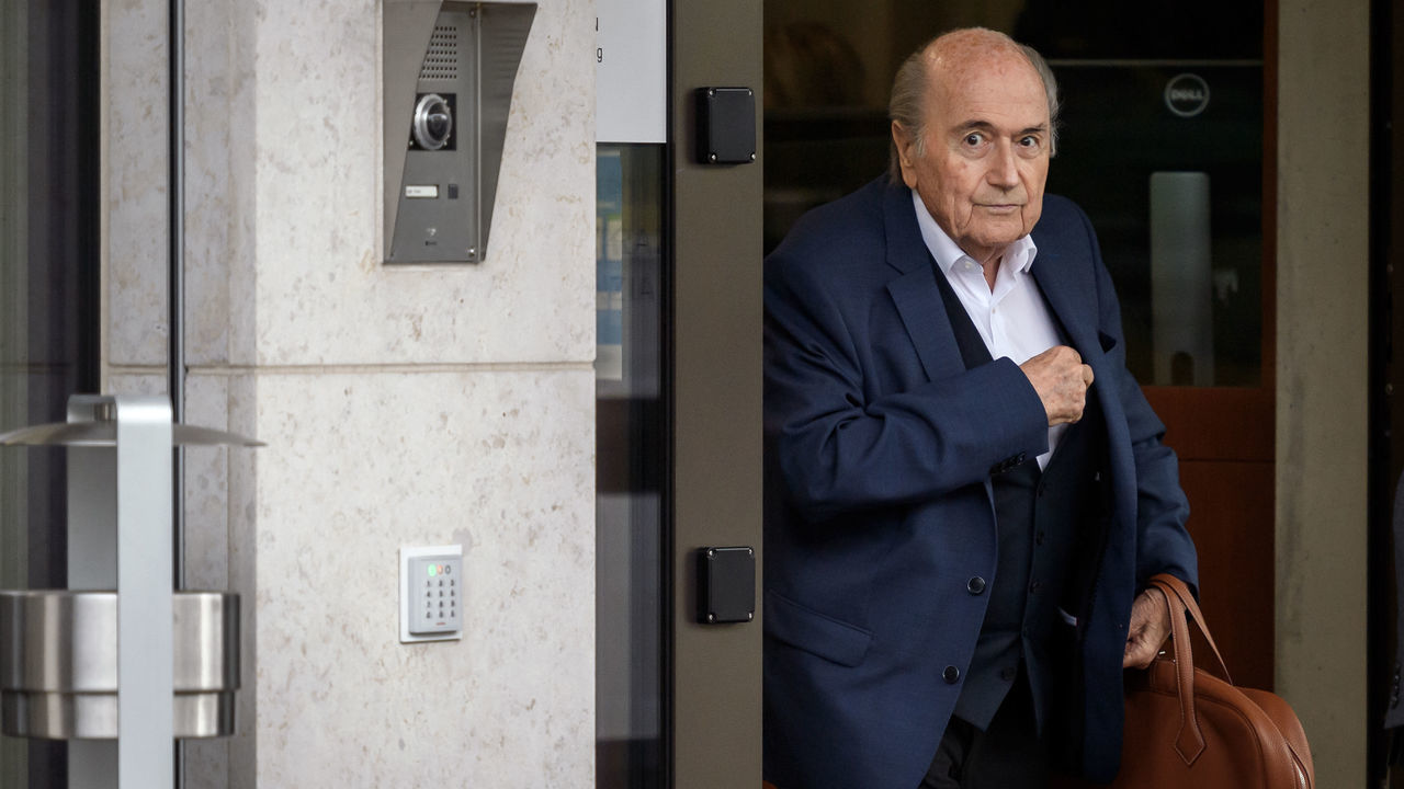 Former president of World football's governing body FIFA, Sepp Blatter looks on as he arrives at the building of the Office of the Attorney General of Switzerland followed by his lawyer Lorenz Erni to a hearing summoned by Swiss prosecutor on September 1, 2020 in Bern. - Former FIFA president and former UEFA president each face interrogation from the Swiss public prosecutor this week as part of the of the proceedings opened in 2015 over a 2011 payment of 2 million Swiss francs.