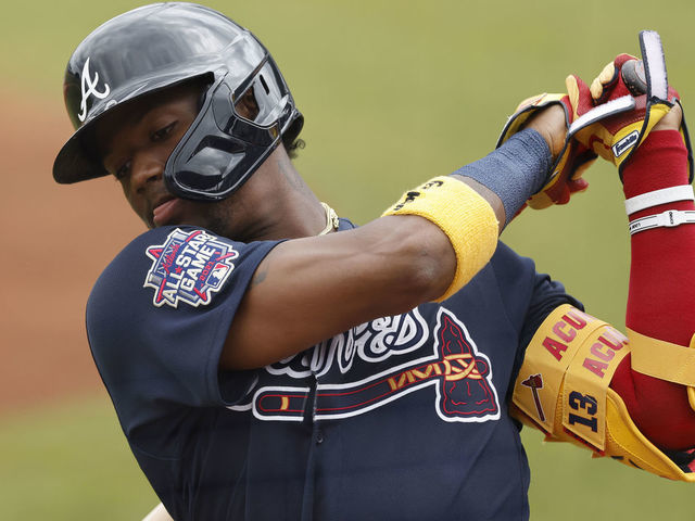 PORT CHARLOTTE, FLORIDA - MARCH 21: Ronald Acuna Jr. #13 of the Atlanta Braves in action against the Tampa Bay Rays during a Grapefruit League spring training game at Charlotte Sports Park on March 21, 2021 in Port Charlotte, Florida.
