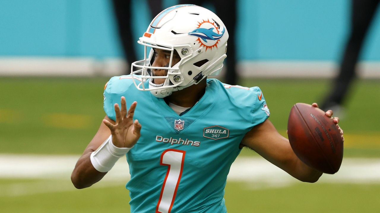 MIAMI GARDENS, FLORIDA - DECEMBER 06: Quarterback Tua Tagovailoa #1 of the Miami Dolphins looks to make a pass play in the first half of the game against the Cincinnati Bengals at Hard Rock Stadium on December 06, 2020 in Miami Gardens, Florida.