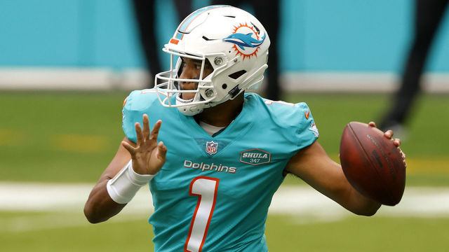MIAMI GARDENS, FLORIDA - DECEMBER 06: Quarterback Tua Tagovailoa #1 of the Miami Dolphins looks to make a pass play in the first half of the game against the Cincinnati Bengals at Hard Rock Stadium on December 06, 2020 in Miami Gardens, Florida.