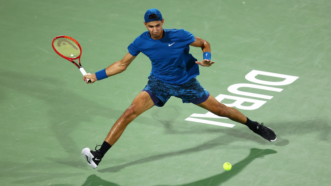 DUBAI, UNITED ARAB EMIRATES - MARCH 14: Alexei Popyrin of Australia plays a forehand shot during their Round One match against Dennis Novak of Austria during Day Eight of the Dubai Duty Free Tennis at Dubai Duty Free Tennis Stadium on March 14, 2021 in Dubai, United Arab Emirates.
