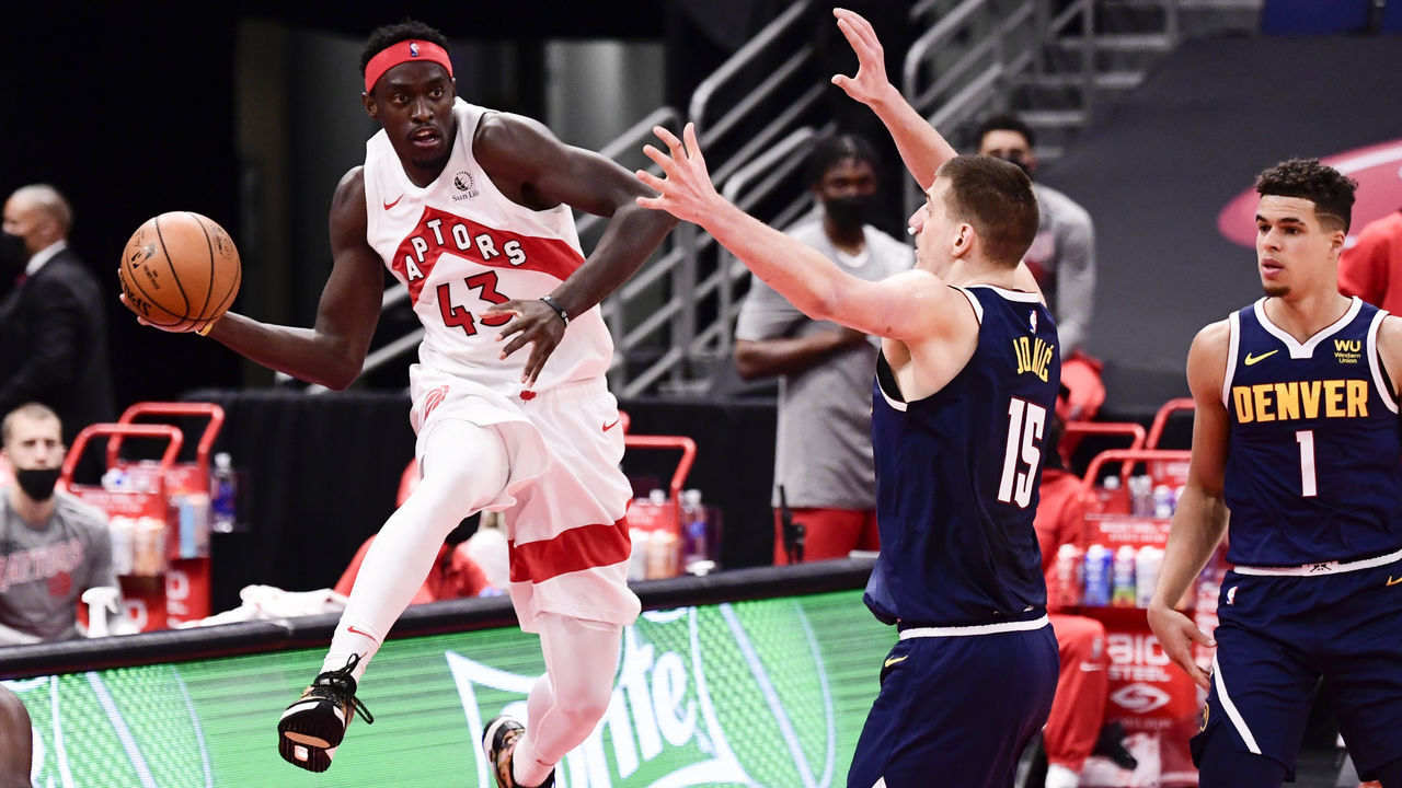TAMPA, FLORIDA - MARCH 24: Pascal Siakam #43 of the Toronto Raptors saves the ball from going out of bounds during the second quarter against the Denver Nuggets at Amalie Arena on March 24, 2021 in Tampa, Florida.