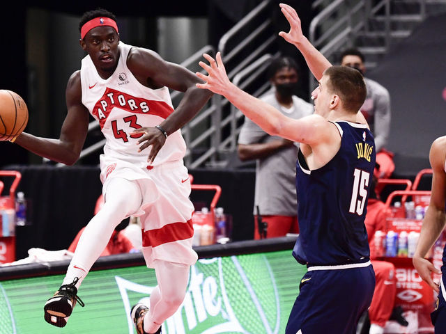 TAMPA, FLORIDA - MARCH 24: Pascal Siakam #43 of the Toronto Raptors saves the ball from going out of bounds during the second quarter against the Denver Nuggets at Amalie Arena on March 24, 2021 in Tampa, Florida.