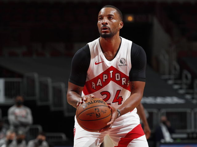 CHICAGO, IL - MARCH 14: Norman Powell #24 of the Toronto Raptors shoots a free throw during the game against the Chicago Bulls on March 14, 2021 at United Center in Chicago, Illinois. Mandatory Copyright Notice: Copyright 2021 NBAE