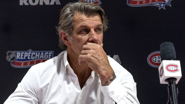 MONTREAL, QC - OCTOBER 07: General manager Marc Bergevin of the Montreal Canadiens sits at the draft table during rounds 2-7 of the 2020 NHL Entry Draft at Bell MTS Place on October 07, 2020 in Montreal, Quebec, Canada. The 2020 NHL Draft was held virtually due to the ongoing coronavirus (COVID-19) pandemic.