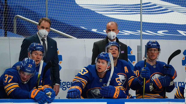 BUFFALO, NY - MARCH 18: Buffalo Sabres interim head coach Don Granato (right) and assistant coach Matt Ellis watch play against the Boston Bruins at KeyBank Center on March 18, 2021 in Buffalo, New York.