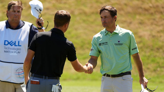 AUSTIN, TEXAS - MARCH 25: Kevin Kisner of the United States shakes hands with Justin Thomas of the United States after winning his match during the second round of the World Golf Championships-Dell Technologies Match Play at Austin Country Club on March 25, 2021 in Austin, Texas.