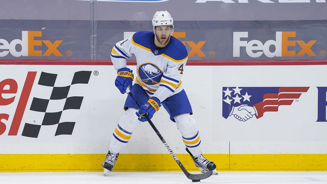 PITTSBURGH, PA - MARCH 24: Buffalo Sabres Left Wing Taylor Hall (4) handles the puck during the second period in the NHL game between the Pittsburgh Penguins and the Buffalo Sabres on March 24, 2021, at PPG Paints Arena in Pittsburgh, PA.
