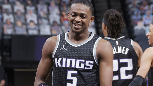 SACRAMENTO, CA - MARCH 25: De'Aaron Fox #5 of the Sacramento Kings smiles during the game against the Golden State Warriors on March 25, 2021 at Golden 1 Center in Sacramento, California. Mandatory Copyright Notice: Copyright 2021 NBAE