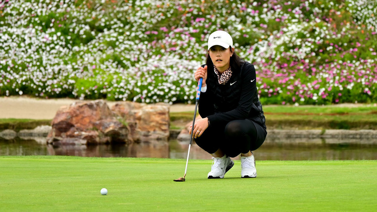 CARLSBAD, CA - MARCH 25: Michelle Wie West lines up a putt on the 8th green hole during Round One of the KIA Classic at the Aviara Golf Club on March 25, 2021 in Carlsbad, California.