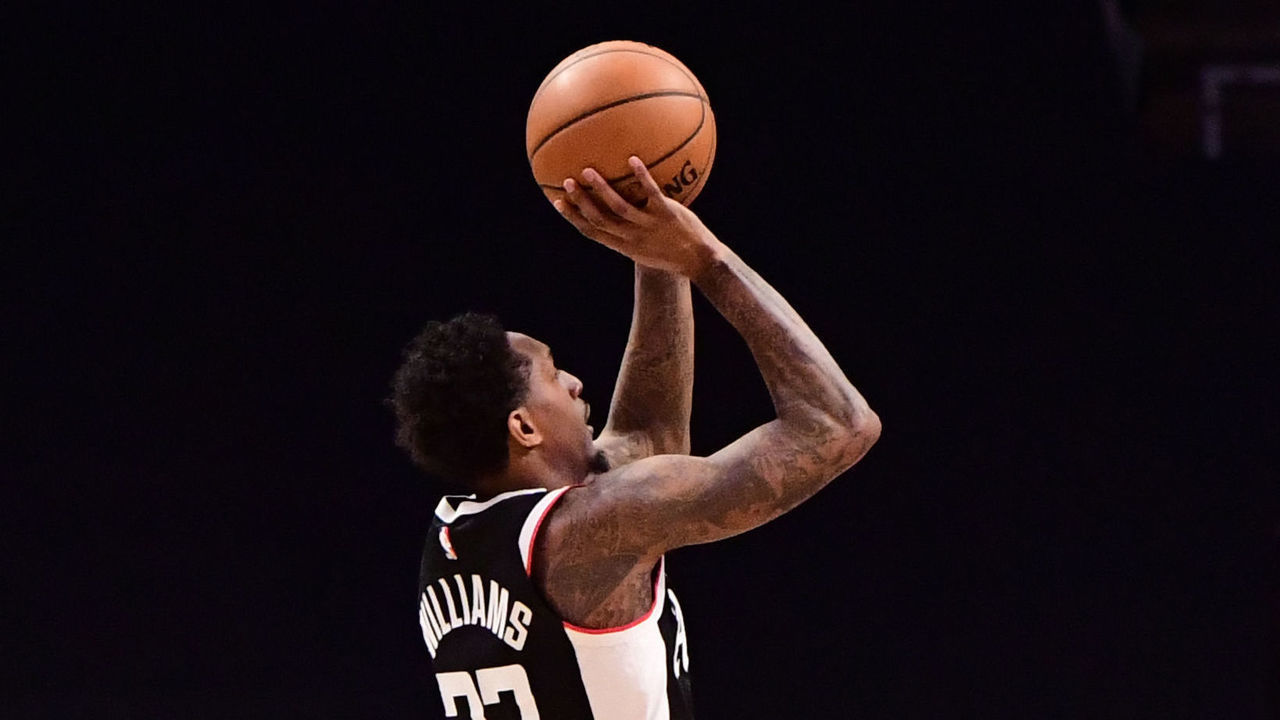 LOS ANGELES, CA - MARCH 20: Lou Williams #23 of the LA Clippers shoots the ball against the Charlotte Hornets on MARCH 20, 2021 at STAPLES Center in Los Angeles, California. NOTE TO USER: User expressly acknowledges and agrees that, by downloading and/or using this Photograph, user is consenting to the terms and conditions of the Getty Images License Agreement. Mandatory Copyright Notice: Copyright 2021 NBAE