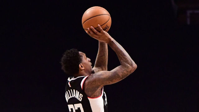 LOS ANGELES, CA - MARCH 20: Lou Williams #23 of the LA Clippers shoots the ball against the Charlotte Hornets on MARCH 20, 2021 at STAPLES Center in Los Angeles, California. NOTE TO USER: User expressly acknowledges and agrees that, by downloading and/or using this Photograph, user is consenting to the terms and conditions of the Getty Images License Agreement. Mandatory Copyright Notice: Copyright 2021 NBAE