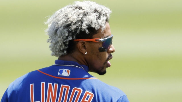 JUPITER, FLORIDA - MARCH 17: Francisco Lindor #12 of the New York Mets looks on against the Miami Marlins during the fourth inning of a Grapefruit League spring training game at Roger Dean Stadium on March 17, 2021 in Jupiter, Florida.
