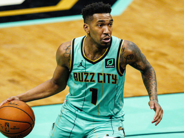 CHARLOTTE, NORTH CAROLINA - MARCH 26: Malik Monk #1 of the Charlotte Hornets looks to pass against the Miami Heat during the third quarter at Spectrum Center on March 26, 2021 in Charlotte, North Carolina.